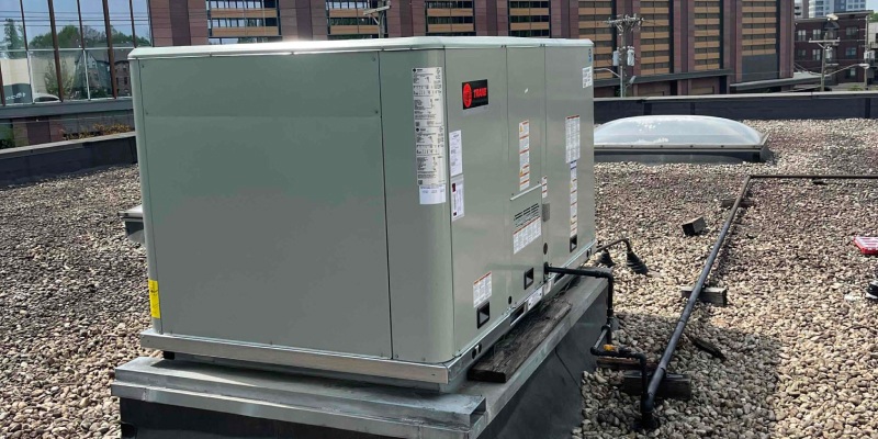 trane commercial unit on a bed of rocks